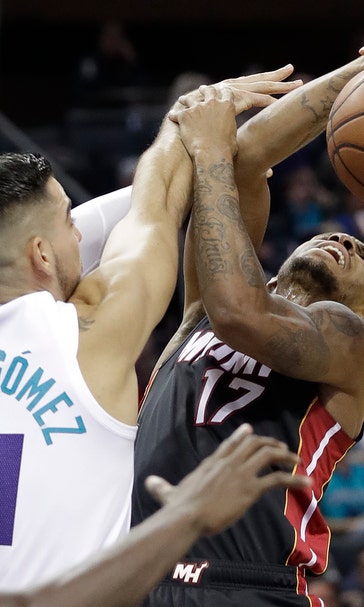 Tony Parker’s double-double lifts Hornets past Heat 125-113